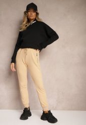 Beżowe Spodnie Dresowe z Bawełny High Waist Ozdobione Kieszeniami na Suwak Fedela. Brązowe jeansy Renee, l, bez wzorów, z bawełny, z podwyższonym stanem. W wyprzedaży za 39.99 zł.