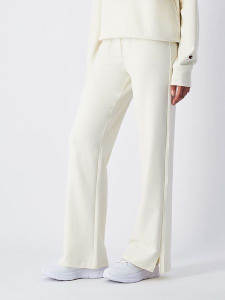 Champion Spodnie dresowe w kolorze białym rozmiar: M. Białe spodnie dresowe Champion, bez wzorów, z dresówki. Za 96.83 zł.