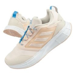 Buty adidas Duramo W GW4148 beżowy. Brązowe buty do biegania bez wzorów, z gumy, bez zapięcia, do biegania. Za 310.46 zł.