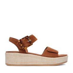 Sandały Remonte. Brązowe sandały Remonte, bez wzorów, bez obcasa, na koturnie, bez zapięcia. Za 379.99 zł.