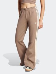 Adidas Spodnie dresowe w kolorze beżowym rozmiar: M. Brązowe spodnie dresowe adidas, bez wzorów, z dresówki. Za 226.77 zł.