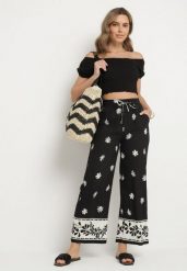 Czarne Szerokie Spodnie z Wiskozy w Kwiatowy Wzór z Gumką w Pasie Nimiova. Czarne jeansy Born2be, na lato, l, bez wzorów, z jeansu, biznesowe. Za 129.99 zł.