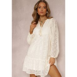 Beżowa Sukienka Laodala. Brązowe sukienki Renee, m, z aplikacjami, boho, bez kołnierzyka, bez ramiączek, mini, rozkloszowane. W wyprzedaży za 142.99 zł.