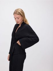 Marynarka z wiązaniem - czarny. Czarne marynarki i żakiety Reserved, l, bez wzorów, z dzianiny, bez ramiączek. Za 119.99 zł.