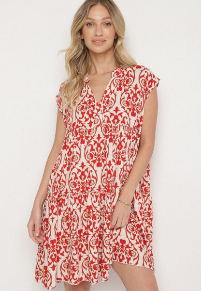 Czerwona Bawełniane Sukienka o Rozkloszowanym Kroju Ozdobiona Falbanką Linola. Czerwone sukienki Born2be, na co dzień, m, bez wzorów, z bawełny, eleganckie, bez kołnierzyka, bez ramiączek, mini, rozkloszowane. Za 49.99 zł.