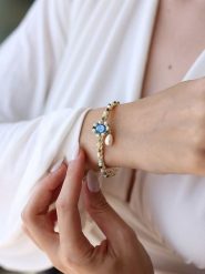 Pierres delicates Pozłacana bransoletka z perłą i amazonitem rozmiar: onesize. Niebieskie bransoletki Pierres delicates, z perłą, pozłacane. Za 113.63 zł.