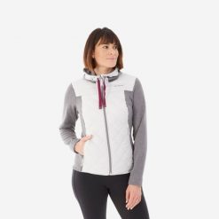 Bluza turystyczna damska Quechua NH100 Hybrid. Szare bluzy z kapturem QUECHUA, m, bez wzorów, z dzianiny, bez kaptura, trekkingowe. W wyprzedaży za 79.99 zł.