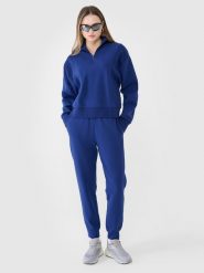 4F Spodnie dresowe joggery damskie - granatowe S. Niebieskie spodnie dresowe 4f, bez wzorów, z bawełny, sportowe. W wyprzedaży za 119.99 zł.