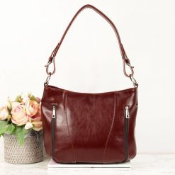 Torebka damska skórzana DAN-A T296 koniak. Brązowe torebki klasyczne DAN-A, bez wzorów, ze skóry, eleganckie, bez dodatków. Za 349.99 zł.