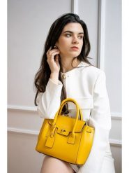 Victor & Hugo Paris Skórzana torebka "Jeny" w kolorze żółtym - 25 x 19 x 7 cm rozmiar: onesize. Żółte torebki klasyczne Victor & Hugo Paris, bez wzorów, z materiału, przez ramię, bez dodatków. Za 347.99 zł.