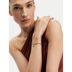 Bransoletka Guess. Żółte bransoletki Guess, złote. Za 179.99 zł.