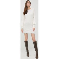 Armani Exchange sukienka wełniana kolor beżowy mini prosta. Brązowe sukienki Armani Exchange, na co dzień, l, bez wzorów, z dzianiny, bez kołnierzyka, bez ramiączek, maxi, proste. Za 709.99 zł.