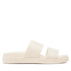Klapki Calvin Klein. Białe klapki Calvin Klein, bez wzorów, bez obcasa, bez zapięcia. Za 549.99 zł.