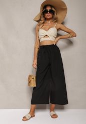 Czarne Spodnie High Waist z Szerokimi Nogawkami z Wiskozą Wykończone Gumką w Talii Crisantas. Czarne jeansy Renee, l, bez wzorów, z jeansu, biznesowe, z podwyższonym stanem. W wyprzedaży za 31.99 zł.