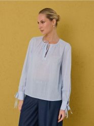 Bawełniana koszula z ozdobnymi wiązaniami - wielobarwny. Koszule Sinsay, l, bez wzorów, z bawełny, bez kołnierzyka, bez ramiączek. Za 49.99 zł.