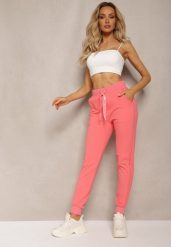 Różowe Dresowe Spodnie High Waist z Błyszczącym Sznurkiem w Pasie Darciasa. Czerwone jeansy Renee, l, bez wzorów, z dresówki, z podwyższonym stanem. W wyprzedaży za 55.99 zł.