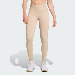 Legginsy Workout Essentials Full-Length Knit. Brązowe legginsy adidas, bez wzorów. W wyprzedaży za 129.35 zł.