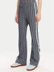 Lacoste Spodnie dresowe XF9313 Granatowy Regular Fit. Niebieskie spodnie dresowe Lacoste, bez wzorów, z bawełny. Za 369.99 zł.