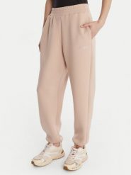 Guess Spodnie materiałowe 169841 Beżowy Slim Fit. Brązowe spodnie dresowe Guess, z aplikacjami, z dresówki. Za 349.99 zł.