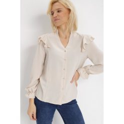 Jasnobeżowa Koszula Sireguna. Brązowe koszule Born2be, l, bez wzorów, eleganckie, bez kołnierzyka, bez ramiączek. W wyprzedaży za 62.99 zł.