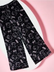 Spodnie polarowe od piżamy Hello Kitty - czarny. Czarne piżamy Sinsay, l, bez wzorów, z polaru, bez kołnierzyka, bez ramiączek. Za 29.99 zł.