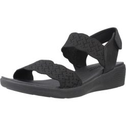 Sandały SKECHERS ARYA Czarny. Czarne sandały Skechers, bez wzorów, z materiału, bez obcasa, bez zapięcia. Za 390.00 zł.