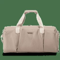 WINGS Torba sportowa SKYLARK beige. Brązowe torby sportowe Wings, bez wzorów, z materiału. Za 99.90 zł.