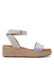 Clarks Skórzane sandały "Kimmei Ivy" w kolorze fioletowym na koturnie rozmiar: 39,5. Różowe sandały Clarks, bez wzorów, z nubiku, z otwartym noskiem, bez obcasa, na koturnie, bez zapięcia. Za 190.97 zł.
