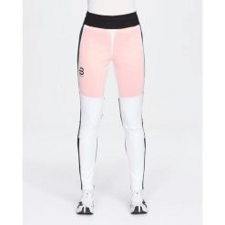 Spodnie narciarskie dla kobiet Daehlie Sportswear Thermo Pro. Białe spodnie narciarskie DAEHLIE, bez wzorów, z materiału, narciarskie. Za 800.50 zł.