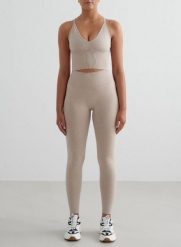 Damskie legginsy invisible scrunch, squat proof Shape Seamless beżowy melanż. Brązowe legginsy AIM'N, bez wzorów, z dzianiny. Za 296.00 zł.