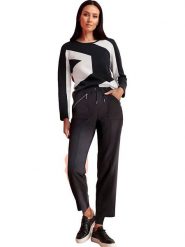 Heine Spodnie dresowe w kolorze czarnym rozmiar: 40. Czarne spodnie dresowe Heine, bez wzorów, z dresówki. Za 109.52 zł.