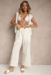Jasnobeżowe Spodnie High Waist z Bawełnianej Tkaniny Zdobionej Haftem Mevirona. Brązowe jeansy Renee, z aplikacjami, z bawełny, eleganckie, z podwyższonym stanem. W wyprzedaży za 47.99 zł.