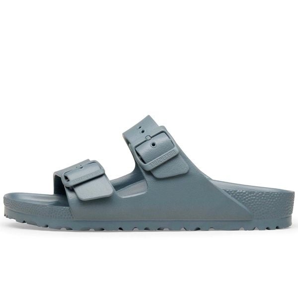 Klapki Birkenstock Arizona Eva Damskie. Szare klapki Birkenstock, bez wzorów, bez obcasa, bez zapięcia. Za 277.85 zł.