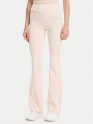 Guess Spodnie dresowe V5RB15 KCD02 Różowy Regular Fit. Czerwone spodnie dresowe Guess, z aplikacjami, z dresówki. Za 299.99 zł.