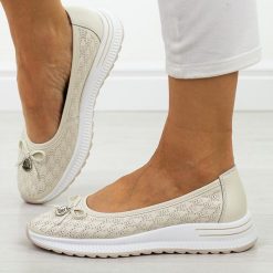 Beżowe skórzane baleriny damskie Filippo Dp6718/26. Brązowe baleriny Filippo, w ażurowe wzory, z jeansu, biznesowe, z okrągłym noskiem, bez obcasa, na płaskiej podeszwie, bez zapięcia. W wyprzedaży za 192.72 zł.