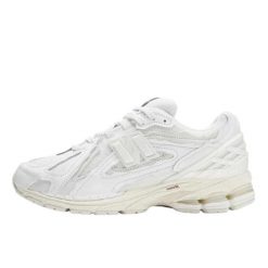 Buty do chodzenia dla dorosłych New Balance 1906D Protection Pack White Leather. Białe buty treningowe New Balance, bez wzorów, z materiału, bez zapięcia, trekkingowe. Za 3,745.58 zł.