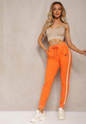 Pomarańczowe Spodnie Dresowe High Waist z Lampasami Skadia. Brązowe jeansy Renee, bez wzorów, z dresówki, sportowe, z podwyższonym stanem. W wyprzedaży za 29.99 zł.