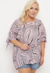 Jasnofioletowa Bluzka z Ozdobnym Wiązaniem przy Rękawach Fialia. Fioletowe bluzki Born2be, plus size, bez wzorów, z jeansu, biznesowe, bez kołnierzyka, plus size, bez ramiączek. Za 99.99 zł.