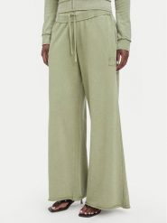 Juicy Couture Spodnie dresowe JCWBJ226321 Khaki Relaxed Fit. Brązowe spodnie dresowe Juicy Couture, bez wzorów, z bawełny. Za 349.99 zł.