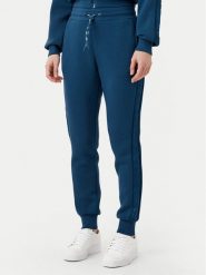 Guess Spodnie dresowe V2YB18 K7UW2 Niebieski Regular Fit. Niebieskie spodnie dresowe Guess, z aplikacjami, z dresówki. Za 229.99 zł.