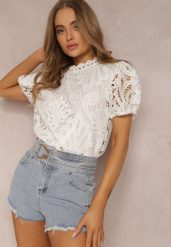 Biała Bluzka Koronkowa Fanoos. Białe bluzki Renee, m, w ażurowe wzory, z koronki, vintage, bez kołnierzyka, bez ramiączek. W wyprzedaży za 75.99 zł.