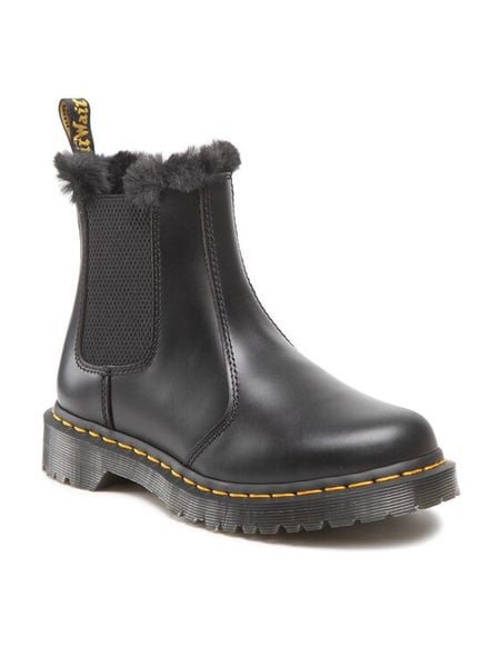 Dr. Martens Sztyblety 2976 Leonore 26332021 Czarny. Czarne botki Dr Martens, bez wzorów, ze skóry, bez obcasa, na płaskiej podeszwie, bez zapięcia. Za 989.99 zł.