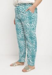 Niebieskie Spodnie Regular z Gumką w Talii i Abstrakcyjnym Dekoltem Cleava. Niebieskie jeansy Born2be, bez wzorów, z jeansu, eleganckie. Za 69.99 zł.