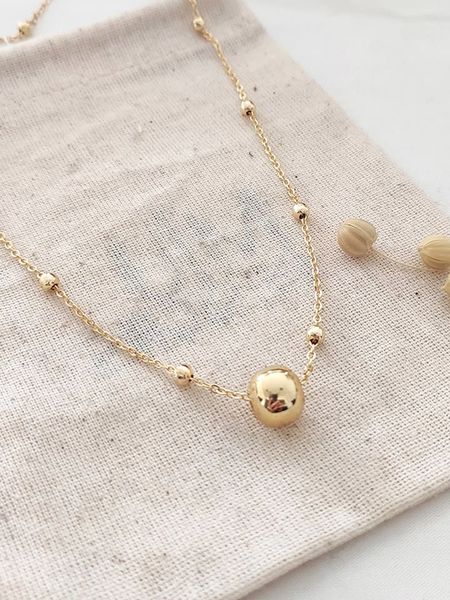 Atelier MIU Pozłacany naszyjnik z elementami ozdobnymi - dł. 42 cm rozmiar: onesize. Żółte naszyjniki atelier MIU, z materiału, pozłacane. Za 50.45 zł.