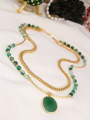 Pierres delicates Pozłacany naszyjnik z elementami ozdobnymi - dł. 50 cm rozmiar: onesize. Zielone naszyjniki Pierres delicates, z materiału, z agatem, pozłacane. Za 65.99 zł.