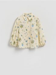 Bawełniana koszula w kwiaty - jasnoniebieski. Niebieskie koszule Reserved, l, bez wzorów, z bawełny, bez kołnierzyka, bez ramiączek. Za 129.99 zł.