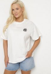 Biały T-shirt z Bawełny z Naszywką Kwiatu Firirene. Białe t-shirty Born2be, l, z aplikacjami, z bawełny, eleganckie, bez kołnierzyka, bez ramiączek. W wyprzedaży za 46.74 zł.