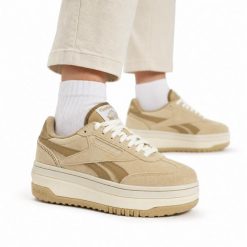 Buty damskie sportowe platformy Reebok SS-CAMPIO EXTRA. Brązowe buty treningowe Reebok, bez wzorów, z jeansu, bez zapięcia, tenisowe. Za 238.00 zł.