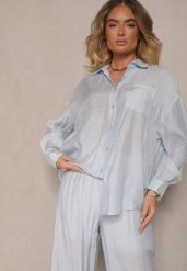 Jasnoniebieska Koszula Oversize w Klasycznym Stylu z Kieszonką Liozira. Niebieskie koszule Renee, l, bez wzorów, biznesowe, bez kołnierzyka, bez ramiączek. W wyprzedaży za 91.99 zł.