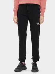 The North Face Spodnie dresowe Standard NF0A5ID4 Czarny Regular Fit. Czarne spodnie sportowe The North Face, bez wzorów, z bawełny. Za 199.99 zł.